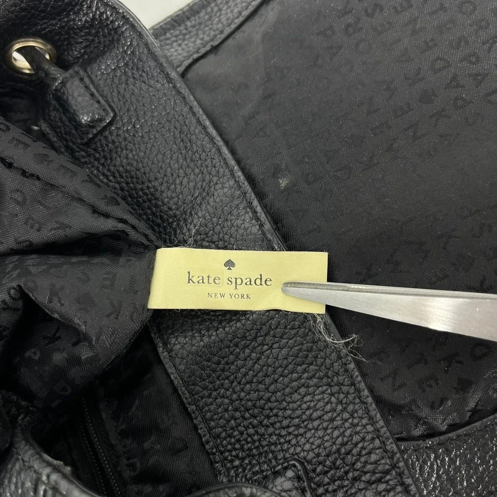 Kate Spade New York Black Pebbled Leather Drawstring Flap Backpack Small